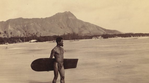 First photo of a surfer in Hawaii around 1890